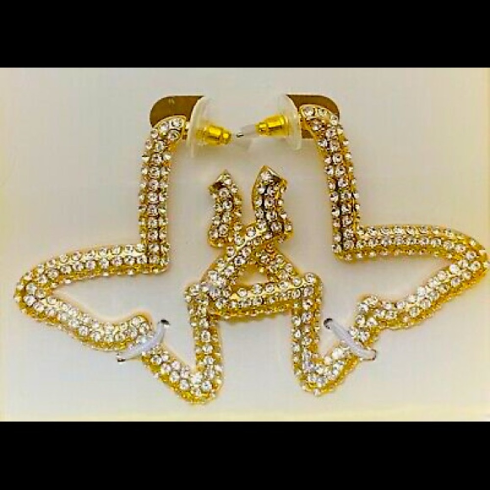Bebe butterfly crystal and gold tones earrings